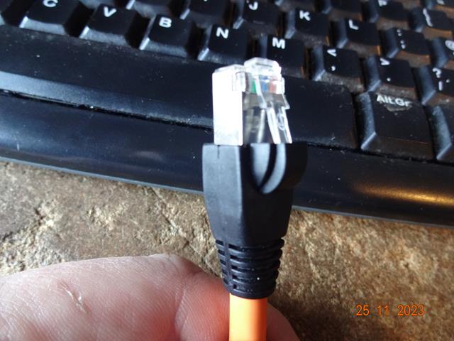 A fully terminated shielded Cat6a connector with boot